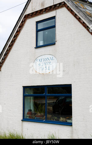 National school building 1834, commemorative plaque, Bosham, a coastal village on the south coast near Chichester, West Sussex, southern England, UK Stock Photo