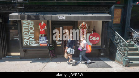 A 2nd Time Around consignment store in the Soho neighborhood of New York on Friday, June 9, 2017. The popular consignment shop with almost two dozen locations in the U.S. is reported to be closing its doors citing increased competition from online retailers and increasing rents. 2nd Time Around is also reported to be not paying consignees whose goods sold prior to May 1.(© Richard B. Levine) Stock Photo