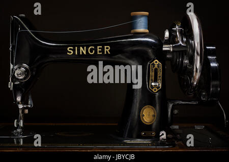 Beautiful product design from the early 1900's, the Singer 99K sewing machine was introduced in 1911 and stayed in production until the 1950's. Stock Photo