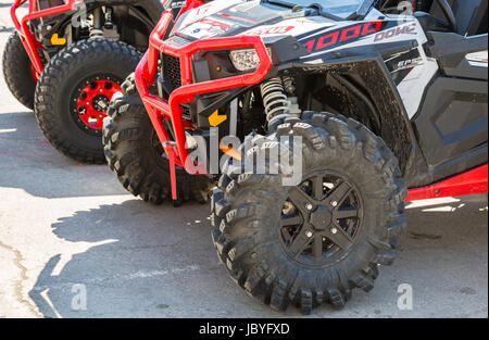 Samara, Russia - May 13, 2017: Wheels of atv quad bikes parked at the city street Stock Photo