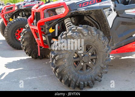 Samara, Russia - May 13, 2017: Wheels of atv quad bikes parked at the city street Stock Photo