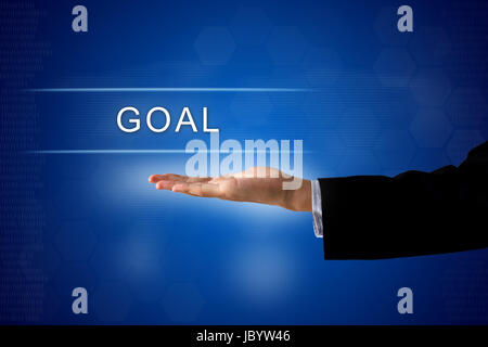 goal button with business hand on a touch screen interface Stock Photo