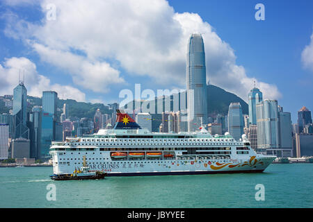 Hong Kong, China - September 6, 2015 : Star Cruises Pisces in Victoria Harbor, Hong Kong. Hongkong is a major tourist city in Asia,More than 40000000  Stock Photo