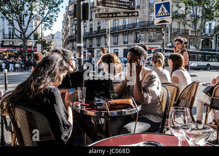 PARIS FRANCE - CAFE TERRASSE ON BOULEVARD- PARIS CAFE - PARIS PEOPLE © Frédéric BEAUMONT Stock Photo