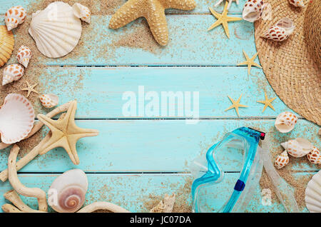 beach accessories on wooden board Stock Photo