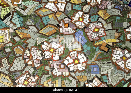 Handmade glass tiles in urban walls, decoration and construction Stock Photo