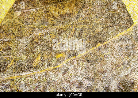 Handmade glass tiles in urban walls, decoration and construction Stock Photo