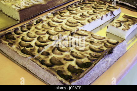 Apple pie caramelized in food market, pastry shop Stock Photo