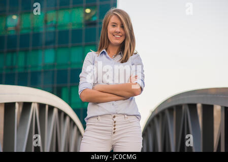 Young happy women or student on the property business background. Beautiful young business woman Stock Photo
