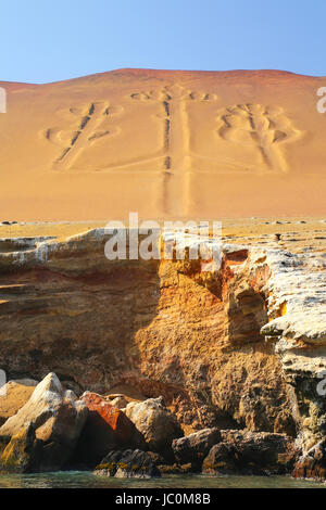 Candelabra of the Andes in Pisco Bay, Peru. Candelabra is a well-known prehistoric geoglyph found on the northern face of the Paracas Peninsula Stock Photo