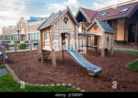 Outdoor shot of big wooden playground at shopping mall Stock Photo