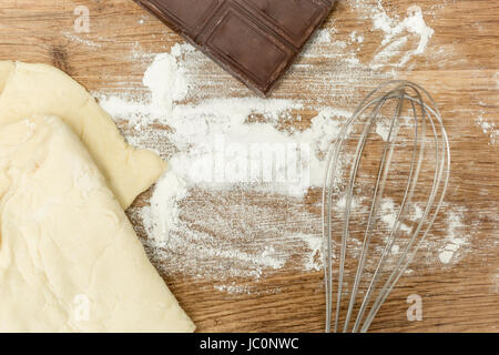 Closeup photo of ingredients for brownie lying on wooden cooking board Stock Photo