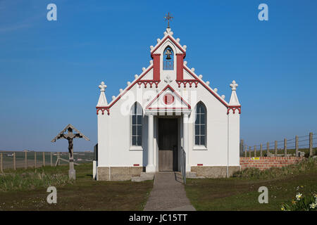 Italian Chapel on Lamb Holm in Orkney, Scotland, made from two Nissen huts by Italian prisoners who built the Churchill Barriers, is filled with art. Stock Photo