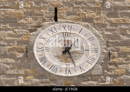 The old clock in the bell tower in the center of  Koper Stock Photo