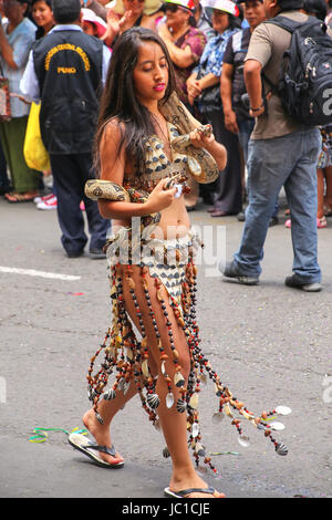 Local woman dancingperforming during Festival of the Virgin de la Candelaria in Lima, Peru. The core of the festival is dancing and music performed by Stock Photo