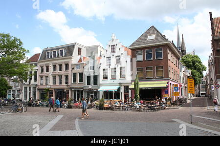 Busy terraces in summer in Utrecht. Medieval square at Ganzenmarkt and Korte Minrebroederstraat in the historic city centre of Utrecht, Netherlands. Stock Photo