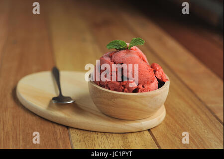 Homemade Organic Strawberry fruit ice cream in bowl Stock Photo