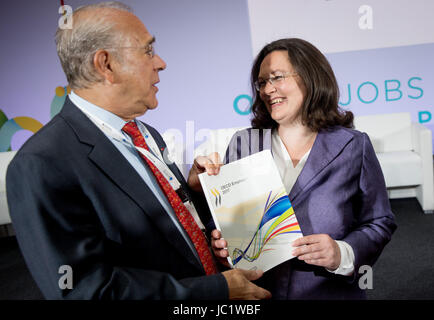 German Minister of Labour Andrea Nahles (SPD) and Angel Gurría, OECD Secretary-General, present the OECD Employment Outlook 2017 with suggestions for the labour market reform in Germany in Berlin, Germany, 13 June 2017. Photo: Kay Nietfeld/dpa Stock Photo