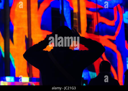 Sydney, Australia. 13th June, 2017. Vivid Sydney Light Festival on the 13th of June. The Vivid Sydney Light festival will run from the 26th of May through to the 17th of June and is one of the largest festivals of its kind in the world. Pictured is the light installation 'Organic Vibrations' projected on the Museum of Contemporary Art Australia (MCA). Credit: mjmediabox/Alamy Live News Stock Photo