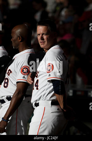 Houston, TX, USA. 12th June, 2017. Houston Astros manager A.J. Hinch (14) stand for the national anthem during the MLB game between the Texas Rangers and the Houston Astros at Minute Maid Park in Houston, TX. John Glaser/CSM/Alamy Live News Stock Photo