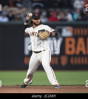 San Francisco, California, USA. 13th June, 2017. San Francisco Giants shortstop Brandon Crawford (35) fielding a ground ball hit by second baseman Whit Merrifield for thew second out in the fifth inning, during a MLB baseball game between the Kansas City Royals and the San Francisco Giants on ''Say Hey Tuesday'' at AT&T Park in San Francisco, California. Valerie Shoaps/CSM/Alamy Live News Stock Photo
