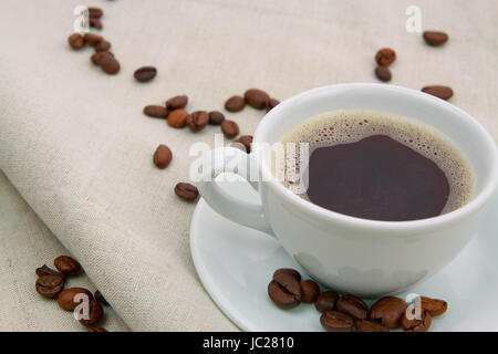 Kaffeetasse auf Jutestoff Stock Photo