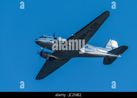 Helsinki, Finland - 9 June 2017: Historical Douglas DC-3 airliner perfoming in the  Kaivopuisto Air Show.  This aircraft two engine all metallic monop Stock Photo