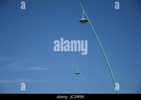 Stylish street lamps against the blue sky Stock Photo