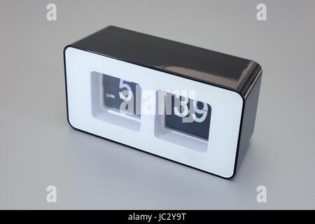 A close up shot of a flip clock Stock Photo