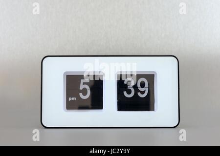 A close up shot of a flip clock Stock Photo