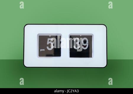 A close up shot of a flip clock Stock Photo