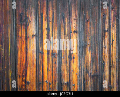 Old rural wooden wall in red-brown colors Stock Photo