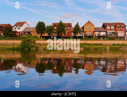 Riverside properties reflected in river Trent, Nottingham, Nottinghamshire, east Midlands, England Stock Photo