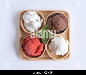 Homemade mixed  Ice cream scoops on wooden bowl Stock Photo