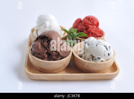 Homemade mixed  Ice cream scoops on wooden bowl Stock Photo