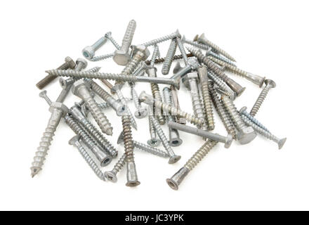 Mixed pile of screws and bolts of different sizes and kinds, isolated on a white background Stock Photo