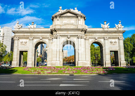 The Puerta de Alcala is a monument in the Plaza de la Independencia ('Independence Square') in Madrid, Spain. It was commissioned by King Carlos III, with construction beginning in 1778. Stock Photo