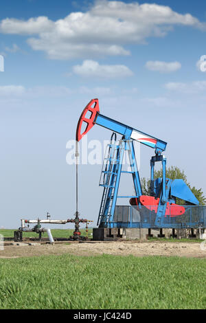 oil pump jack on oilfield Stock Photo