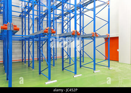 Empty shelves in new distribution warehouse Stock Photo