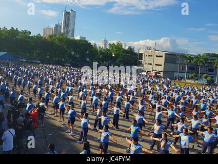 Quezon City, Philippines. 13th June, 2017. PNP at Camp Crame grandstand. The members of Philippine National Police Camp Crame base personnel participated during the nationwide launching of Mission Slim Possible Challenge. Credit: Herman Lumanog/Pacific Press/Alamy Live News Stock Photo