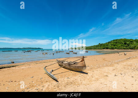 Traditional pirogue on the shore of Nosy Be island in Madagascar, Africa. Stock Photo