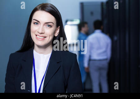 Cheerful happy woman looking at you Stock Photo