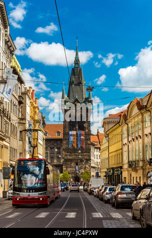 City center’s street with tram and Henry’s Tower in the background, Prague, Bohemia, Czech Republic Stock Photo