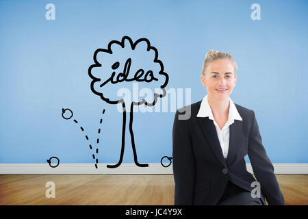 Composite image of blonde young businesswoman sitting on ground Stock Photo