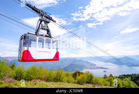 Stresa, Italy, May 22 2017 - an aerial cableway cabin go downhill from the mount Mottarone top to the Lake Maggiore Stock Photo