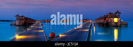 Panoramic view of evening lights in the villas at Gili Lankanfushi, Maldives. Stock Photo