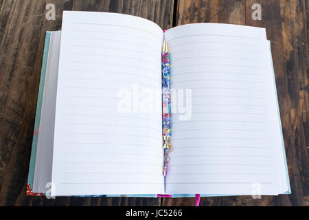 Blank Book on Rustic Wooden Background. Stock Photo