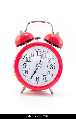 Red Alarm Clock Isolated on White. Stock Photo