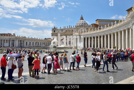 Saint Peter's Square, Vatican City, Rome. Line of people waiting for entrance to Vatican museum Stock Photo