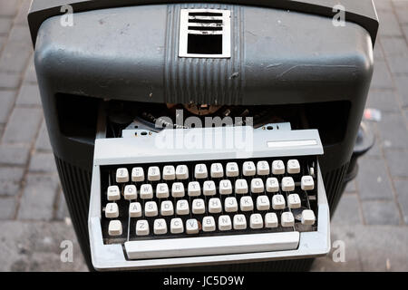 Vintage typewriter on trash can in Madrid Stock Photo